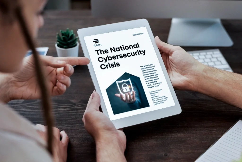 Small business reading Cybersecurity report on a tablet
