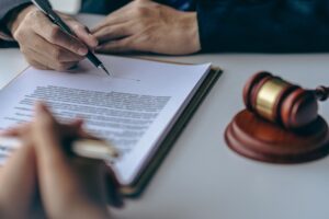 Man signing a contract