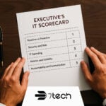 IT Scorecard for business executives being reviewed on a high-end desk