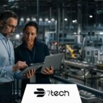 How to Reduce Manufacturing Downtime Caused by IT and Network Issues Reduce Manufacturing Downtime From IT Network Issues with leaders reviewing plant network continuity.