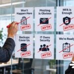 Cybersecurity myths reviewed in an office.
